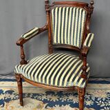 Antique Louis XVI style armchair.