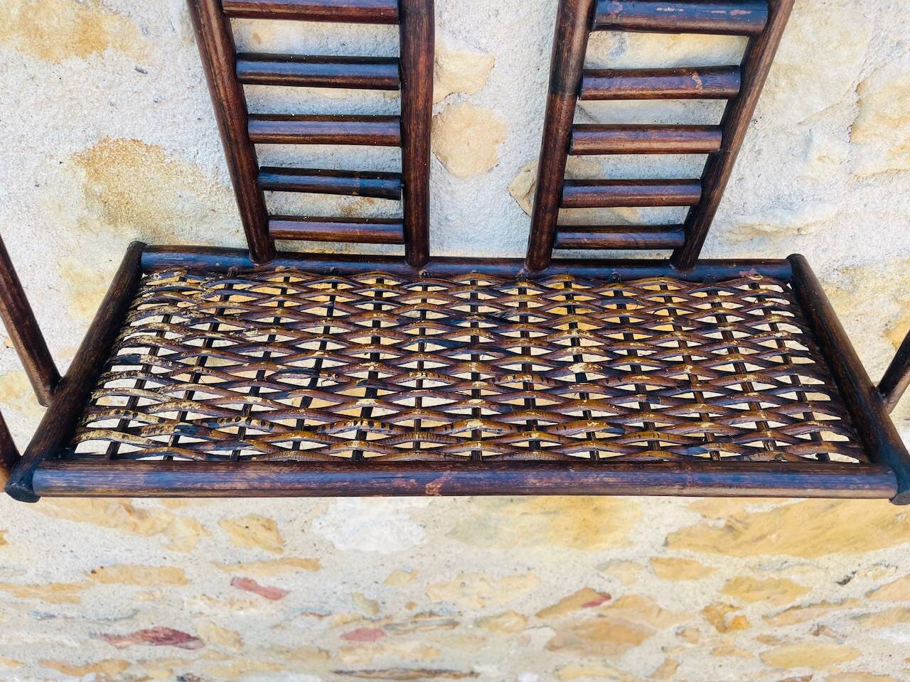 Vintage wall shelf in bamboo and rattan, circa 1960s.