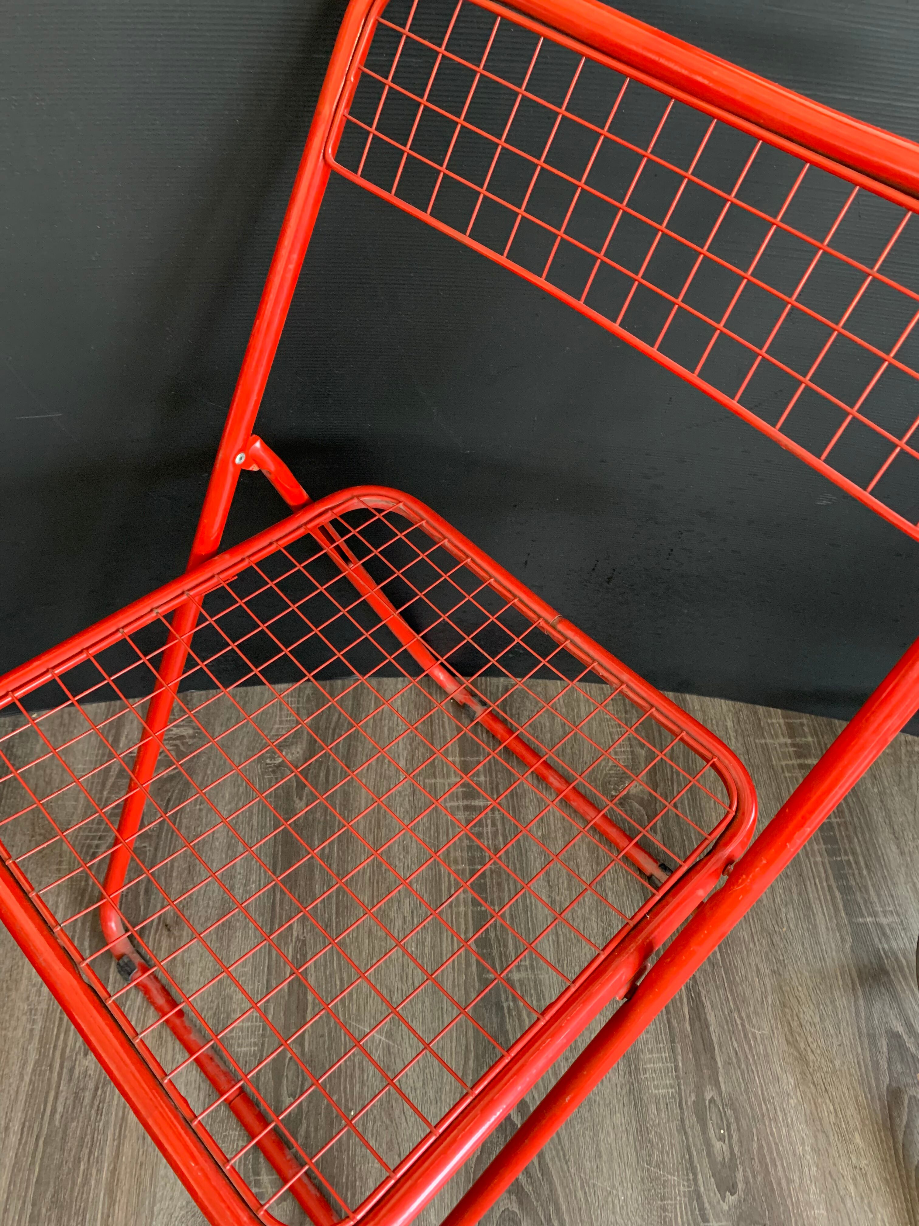 Red "Ted Ned" folding chair by Niels Gammelgaard