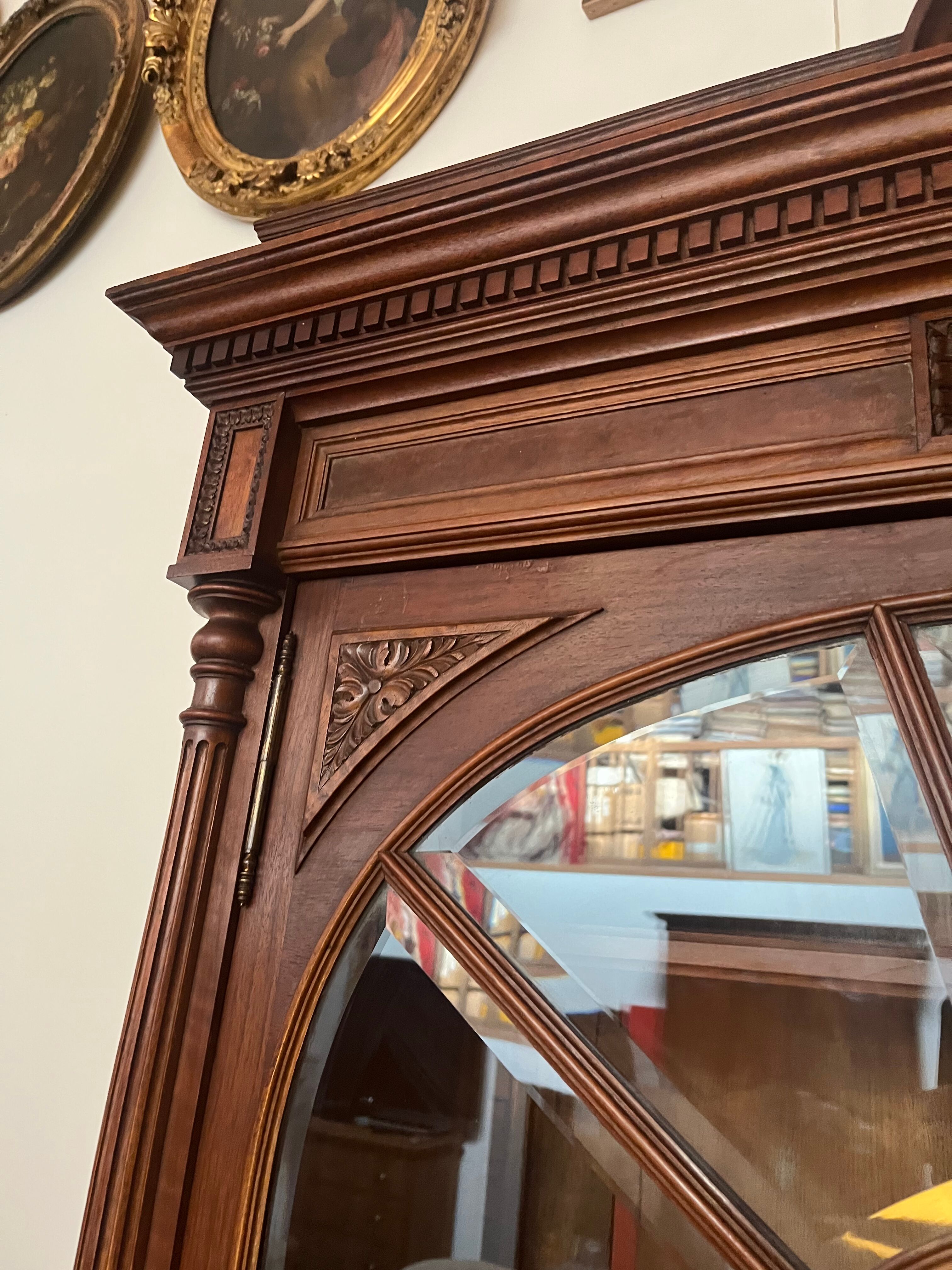 Louis XVI style beveled glass bookcase