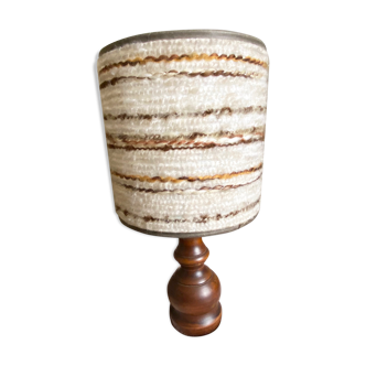 Table lamp in turned wood with wool lampshade