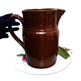 Large brown enamel pitcher