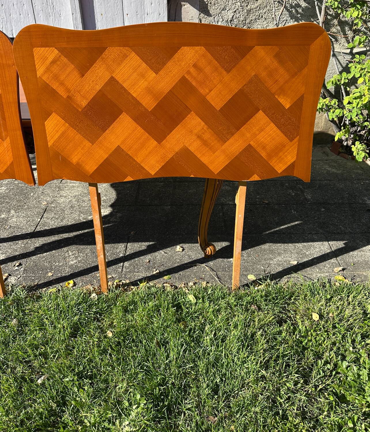 Antique extendable table in cherry wood and marquetry in the Louis XV style.