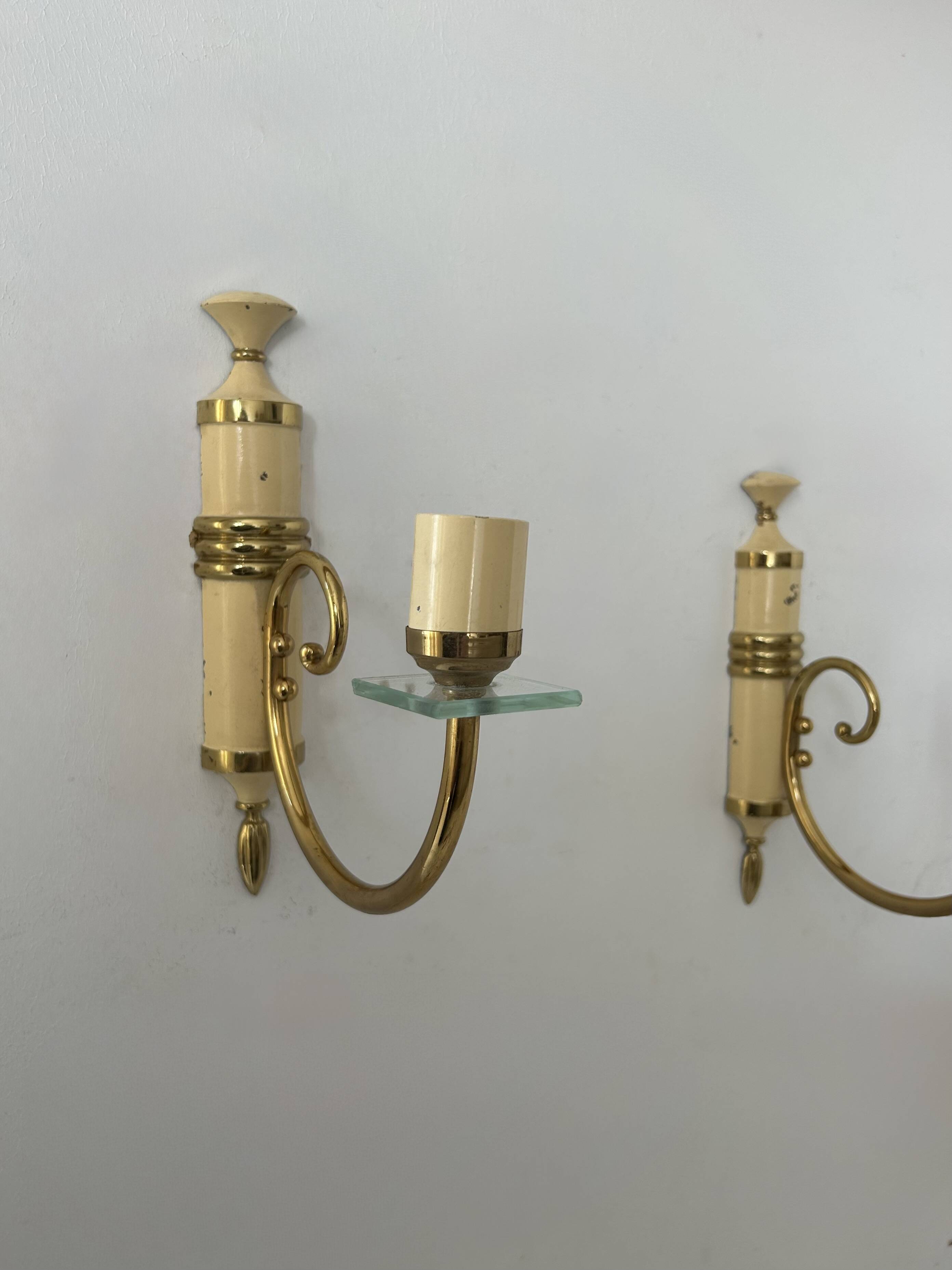 Pair of vintage patinated brass wall lights, France, 1940s
