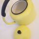 Old kettle enamelled pale yellow