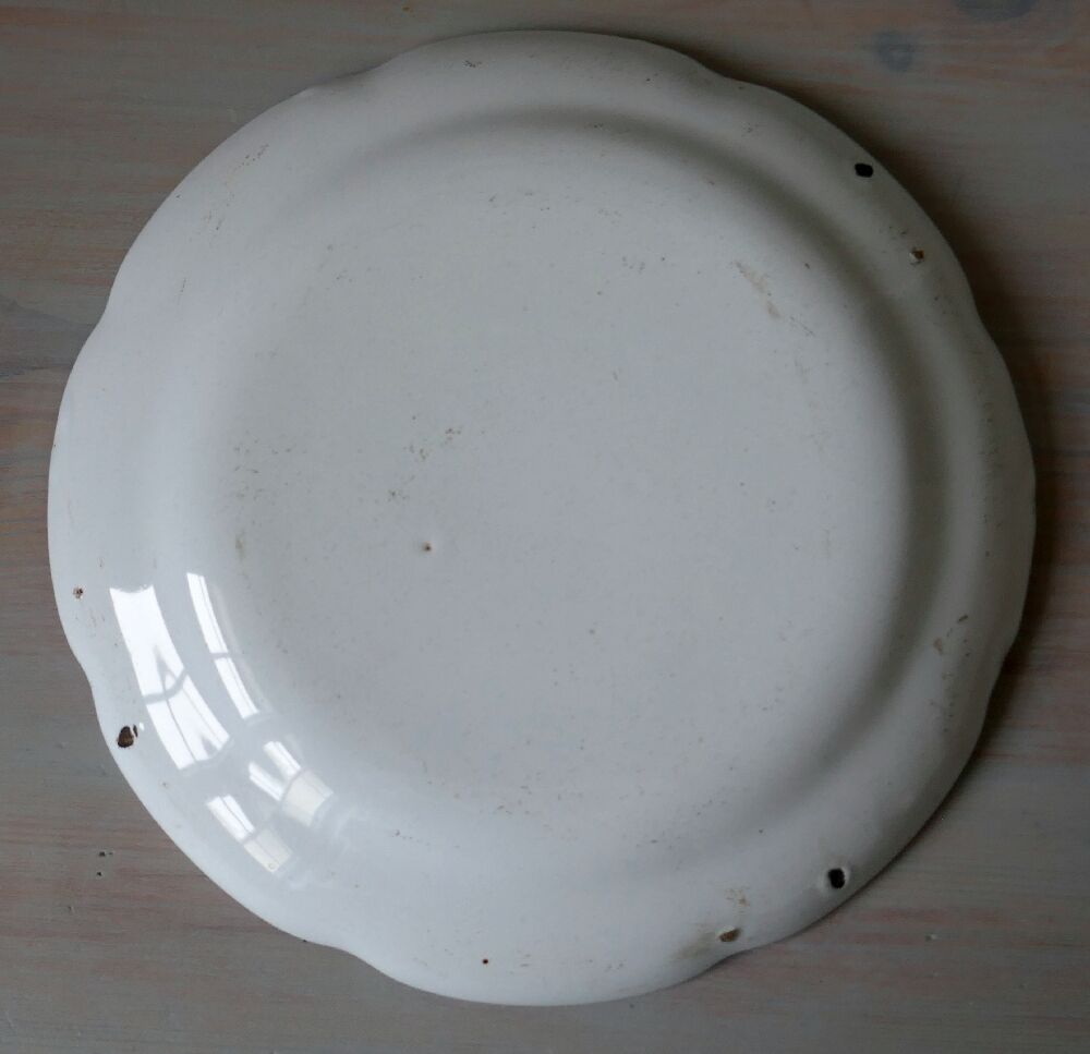 Antique polychrome earthenware plate from eastern France with flower decoration, 19th century