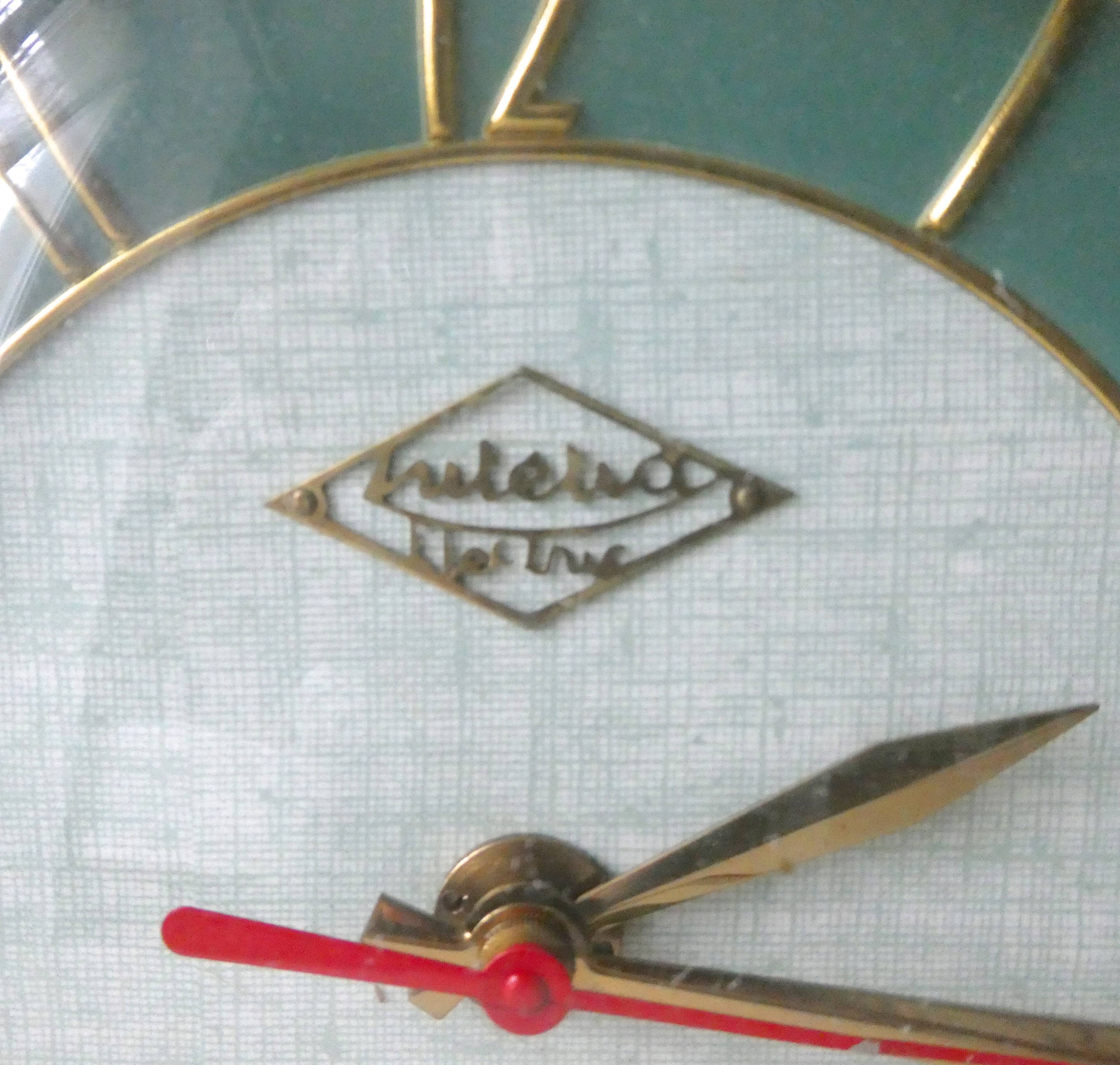 Pendulum wall clock Lutetia in green formica of the 1950s