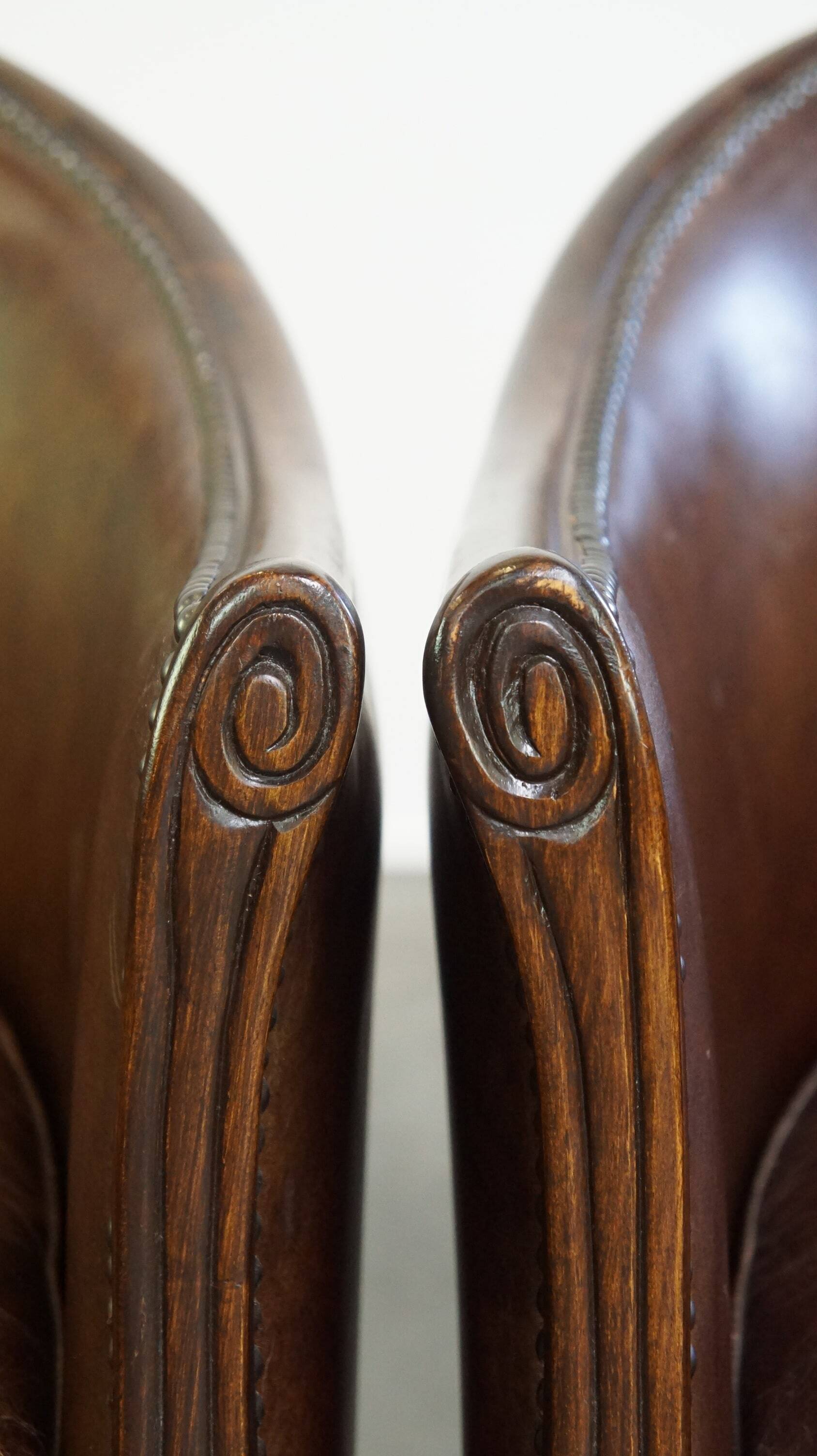 Set of 2 club chairs/armchairs in dark cognac leather