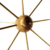 Brass chandelier and black lacquered metal