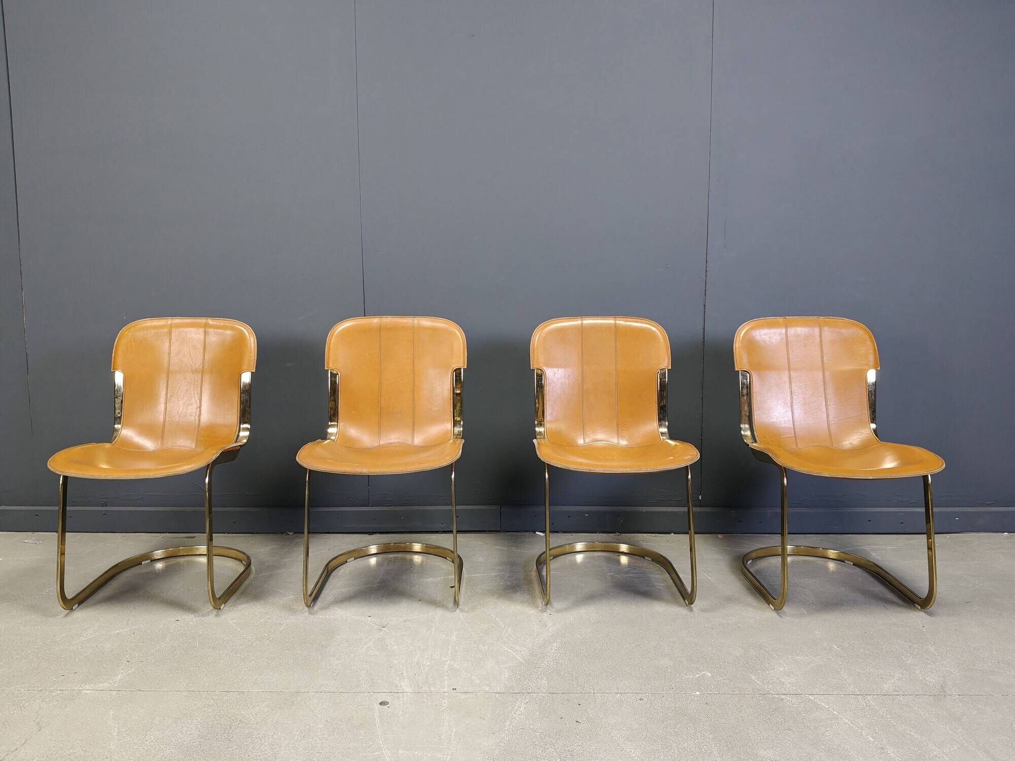 Vintage brass and cognac leather dining chairs by Willy Rizzo for Cidue set of 4