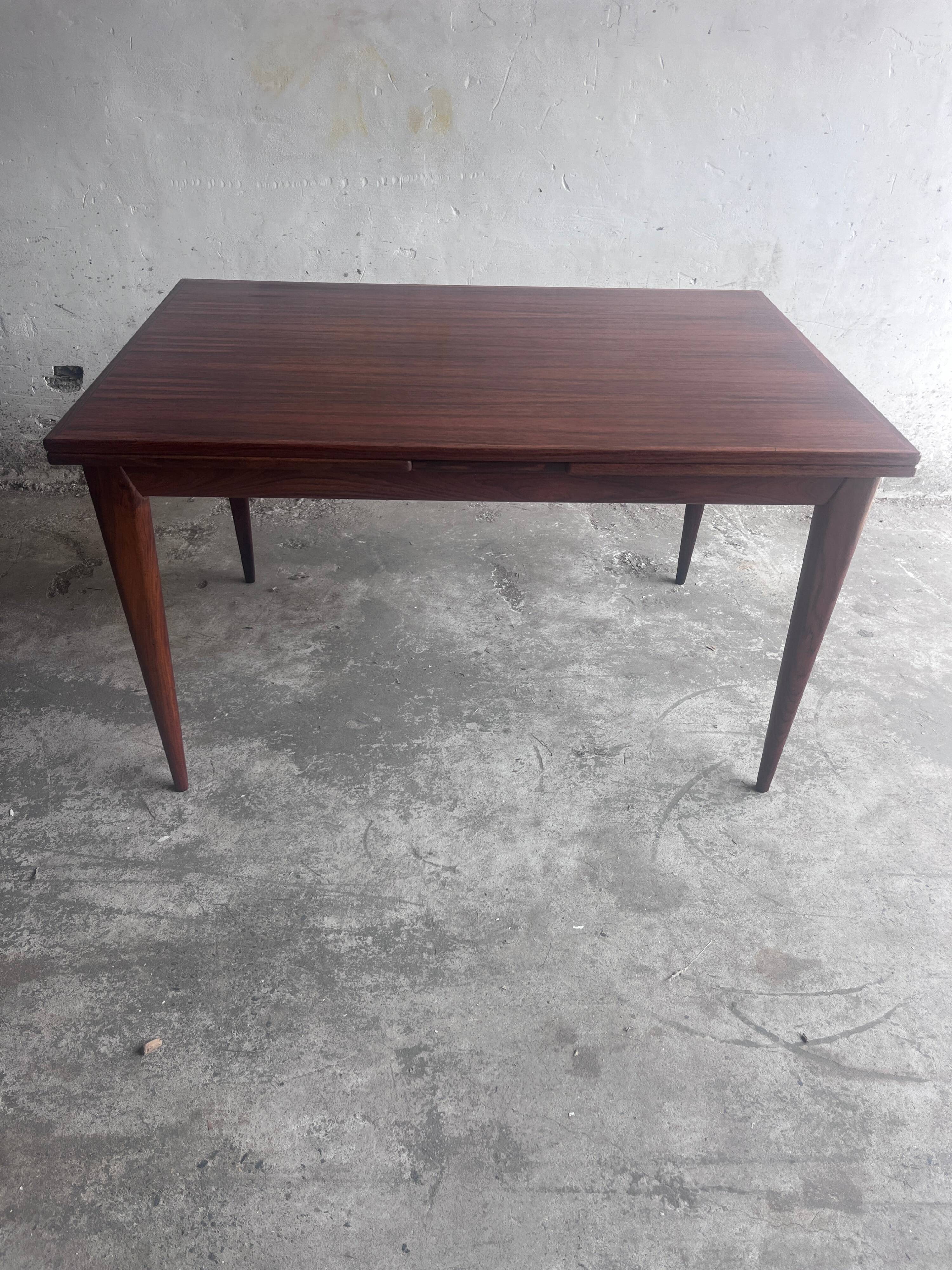 Danish extendable dining table in rosewood by Niels O. Møller, model 254, Denmark, 1960s.