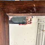 Bevelled mercury mirror with a wooden frame