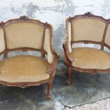 Pair of armchairs basket louis XV in carved walnut