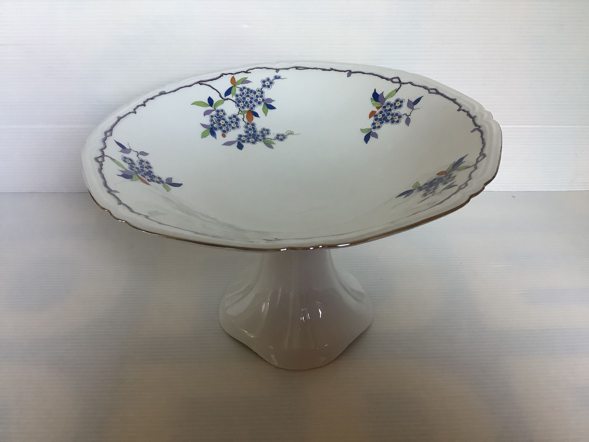 Old shower tray with forget-me-not flowers, Czechoslovakia.
