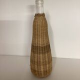 Glass and woven rattan bottle