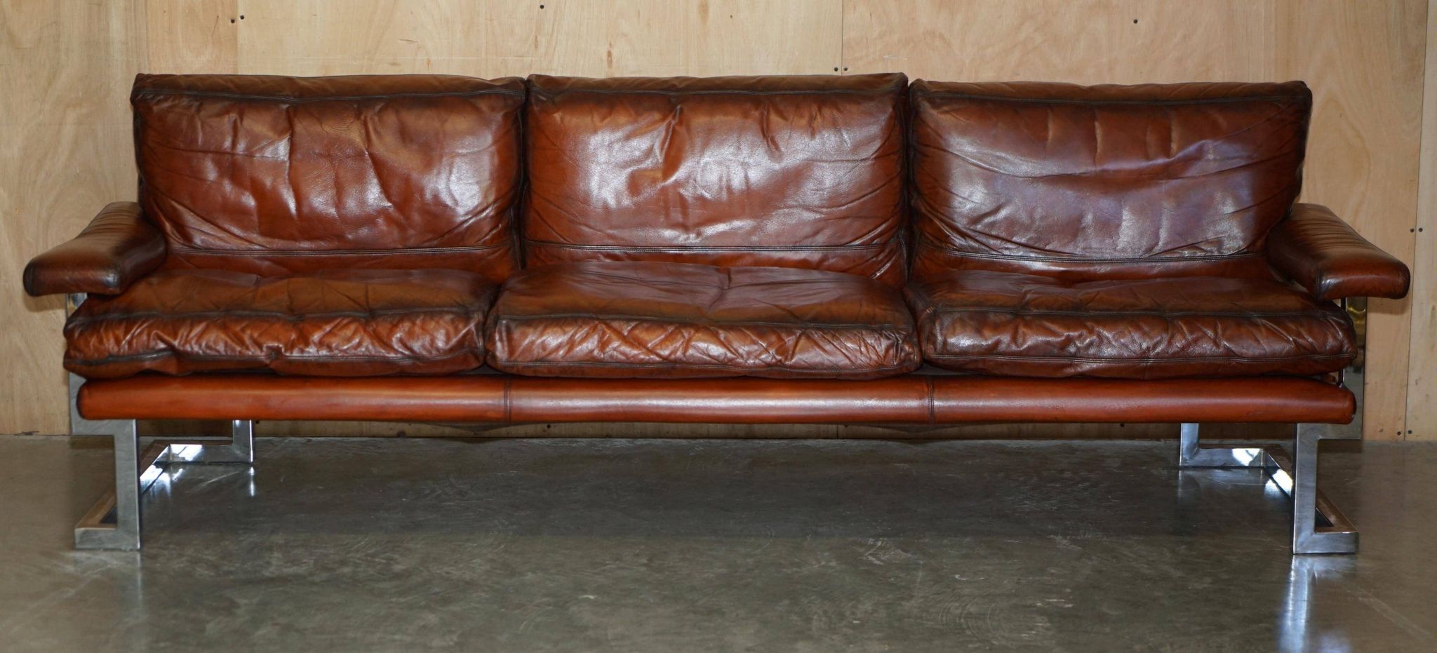 Restored suite Tim Bates for Pieff Mandarin leather chrome hardwood.