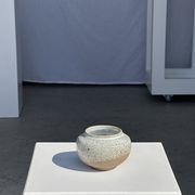 Small white ball vase tight neck in glazed speckled ceramic