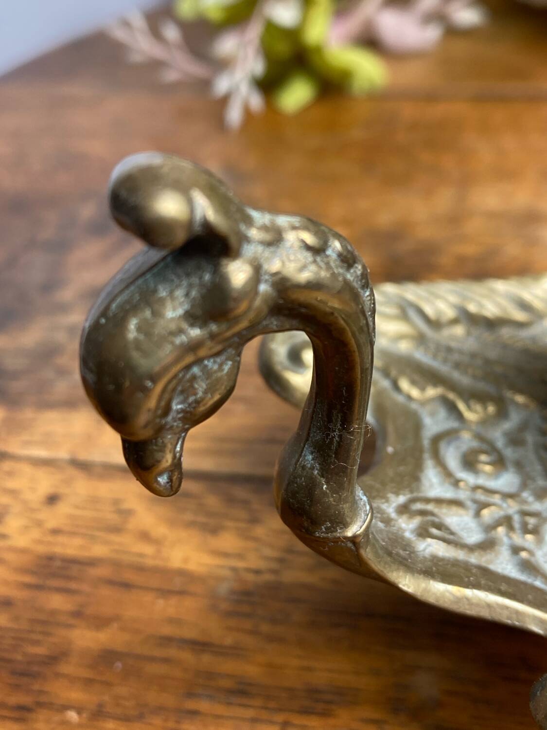 Hand candlestick, peacock shape, in bronze