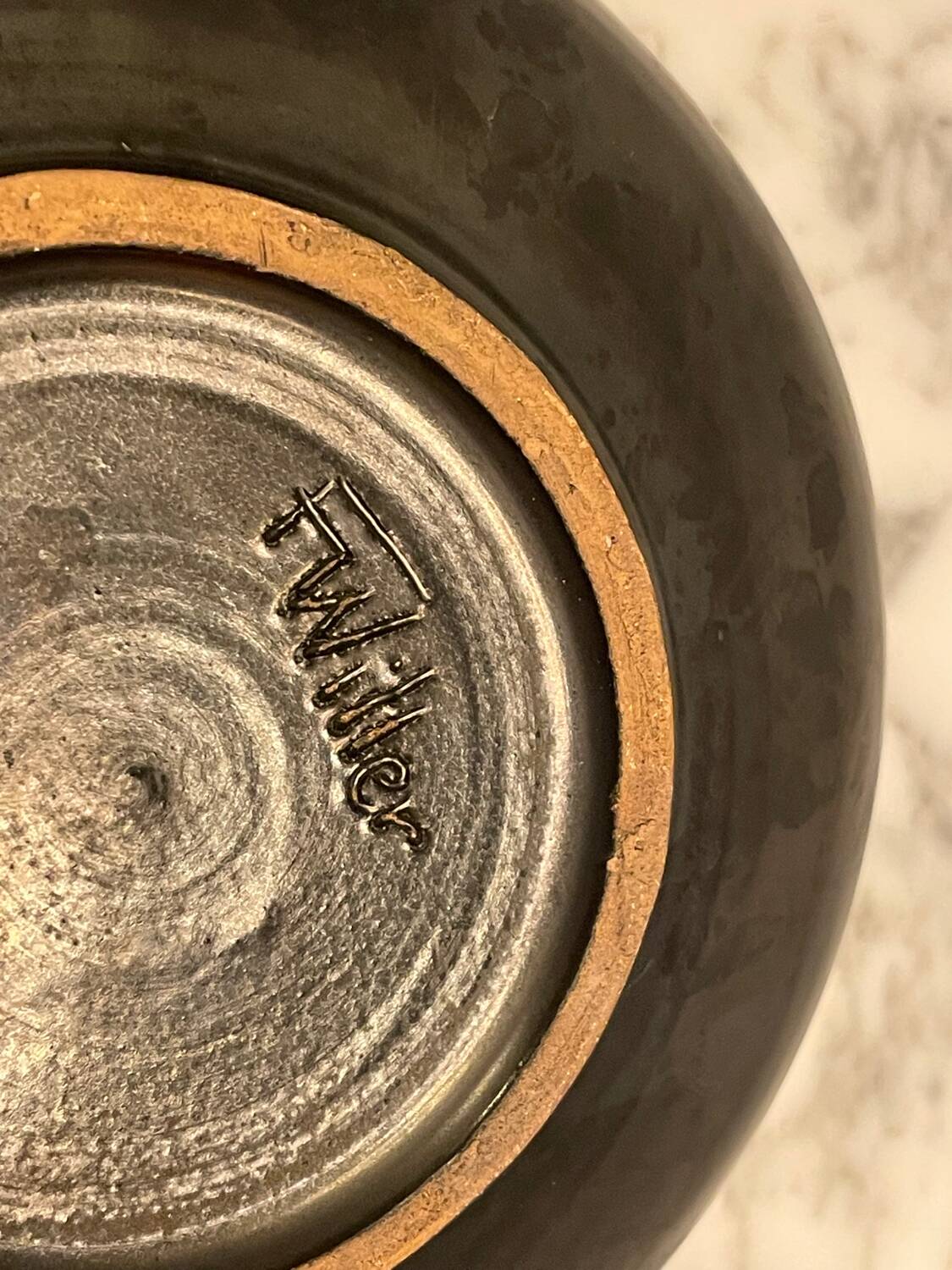 Pocket emptier signed F Willer