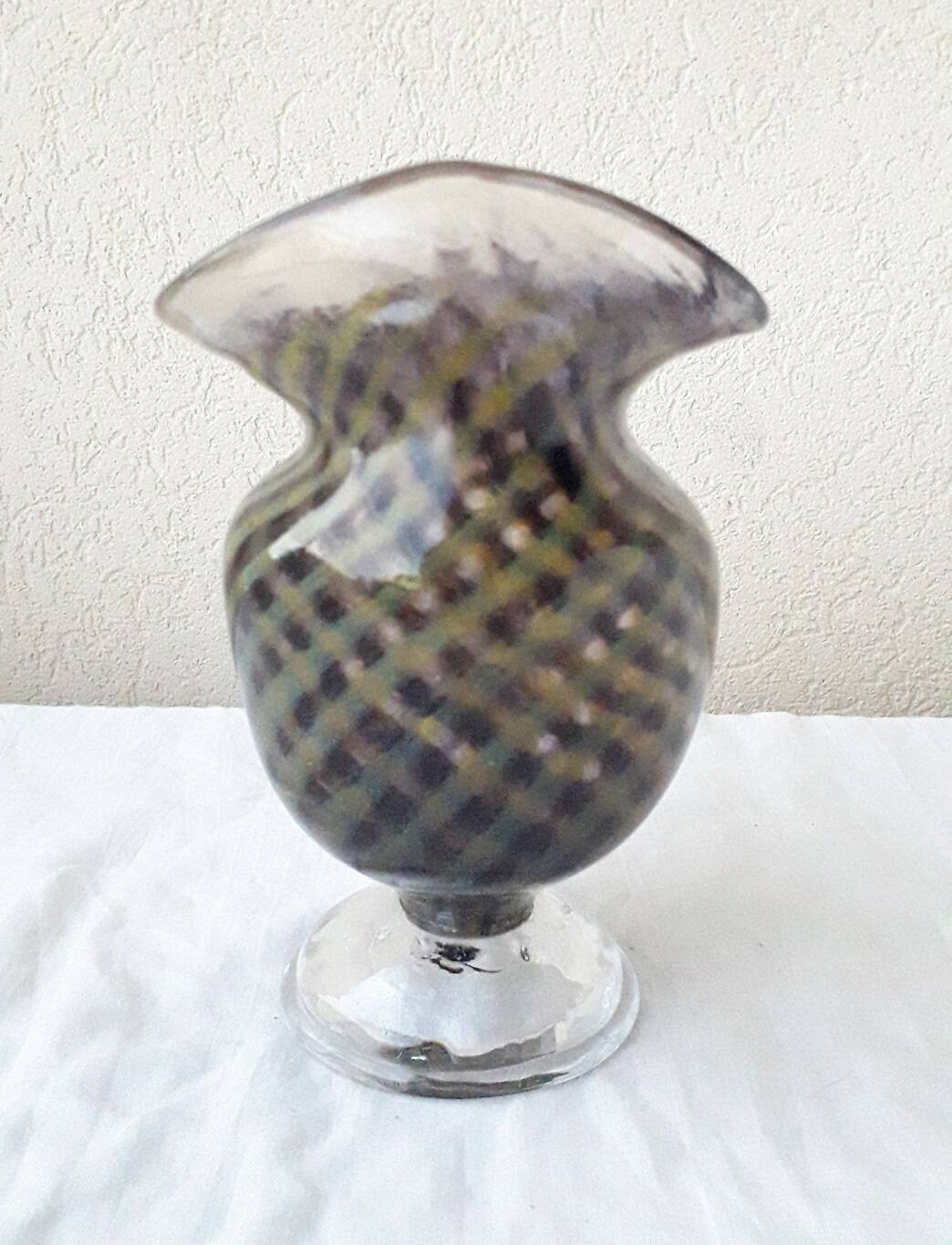 Glass vase on a stand