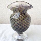 Glass vase on a stand