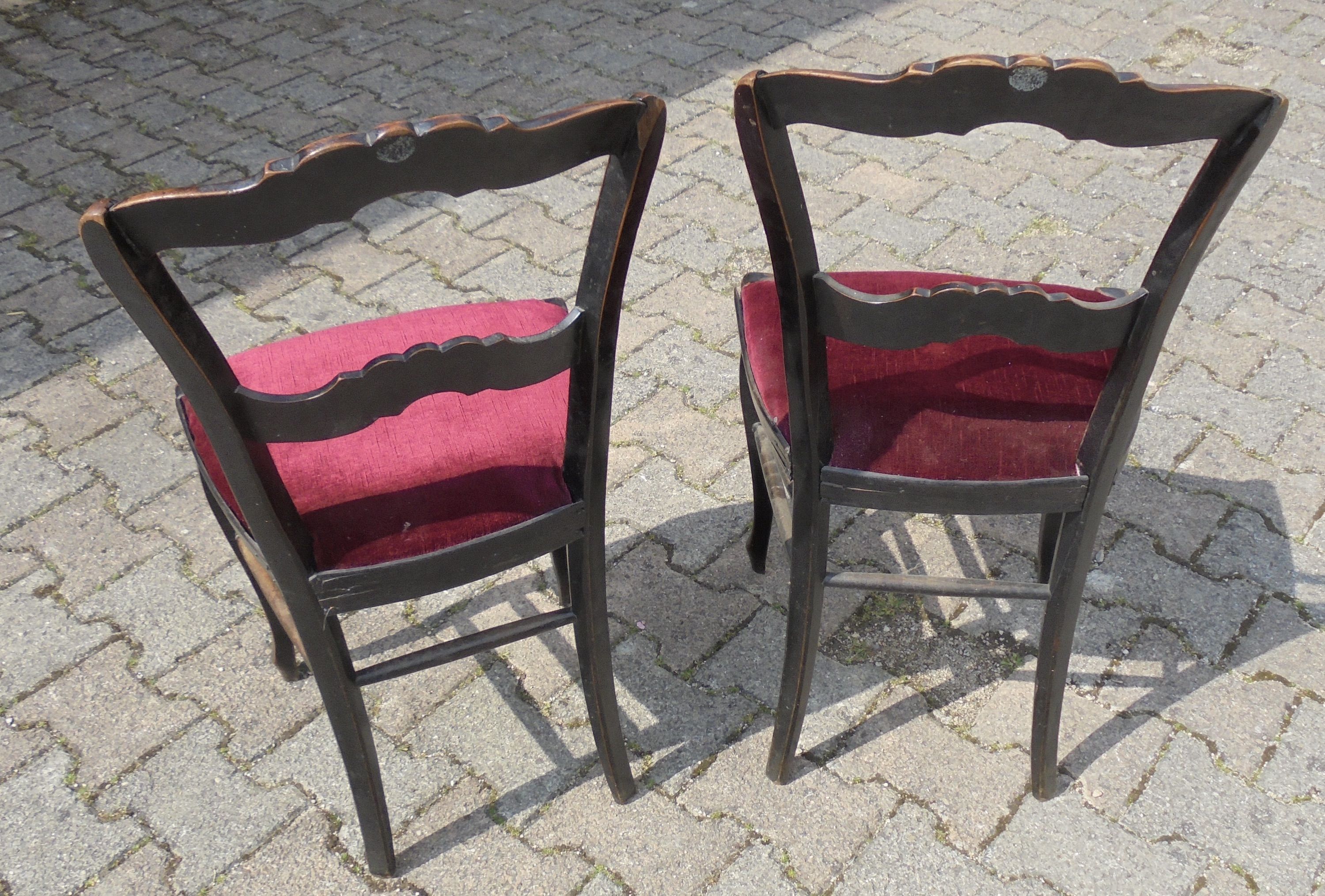 Pair of chairs Napoleon III blackened wood and seat red velvet