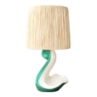 Ceramic lamp evoking a swan, raffia lampshade