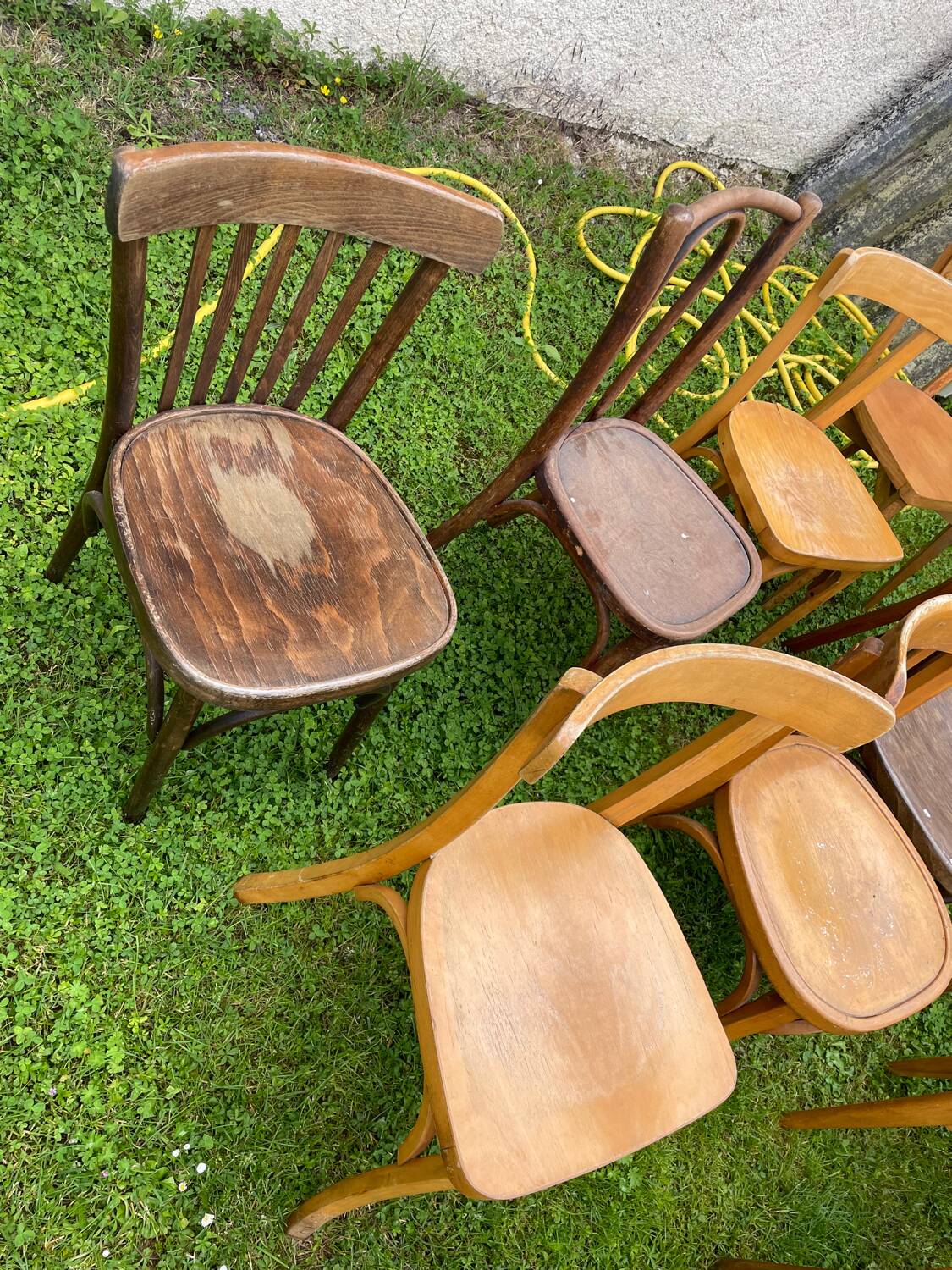 Lot of 16 mismatched bistro chairs