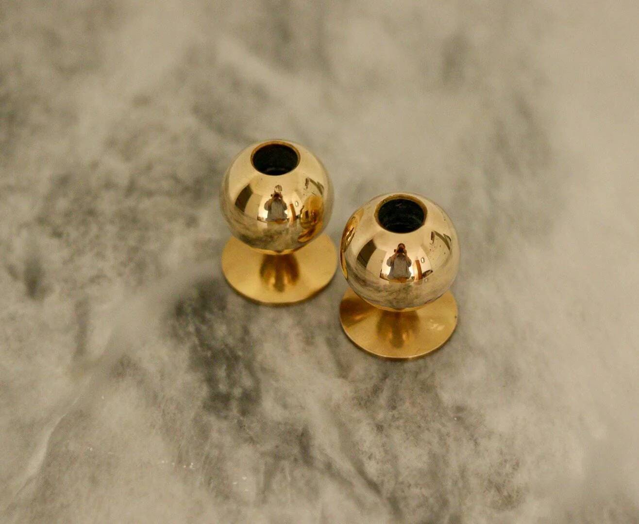Pair of mid-century Swedish brass candle holders