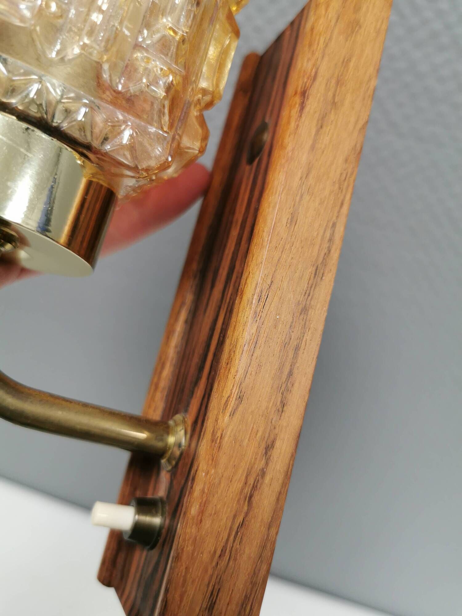 Small, stylish wall lamp with rosewood suspension and hard pressed glass
