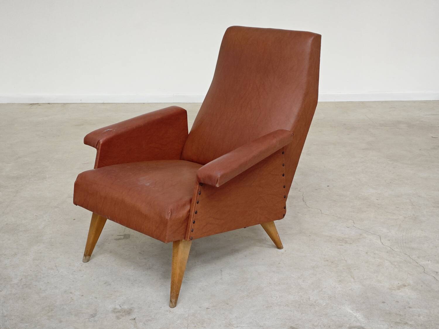 Camel brown imitation leather armchair, France 1960