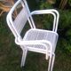 Set of 4 stackable perforated garden armchairs