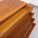 Vintage Scandinavian modernist chest of drawers in rosewood and black metal.