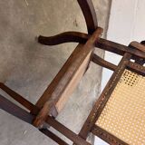 Antique folding chair with weaved seat/back