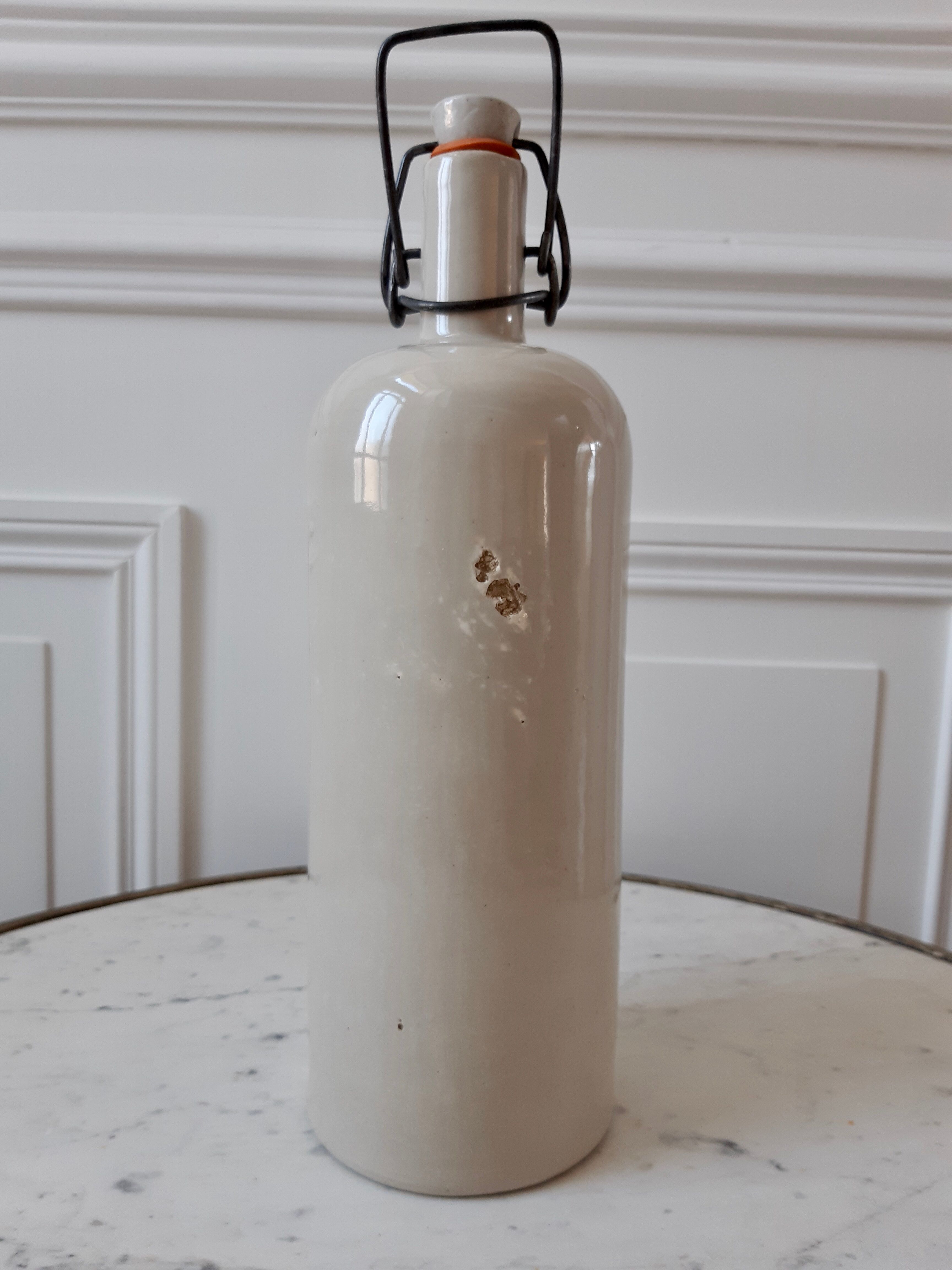 70s beige sandstone bottle