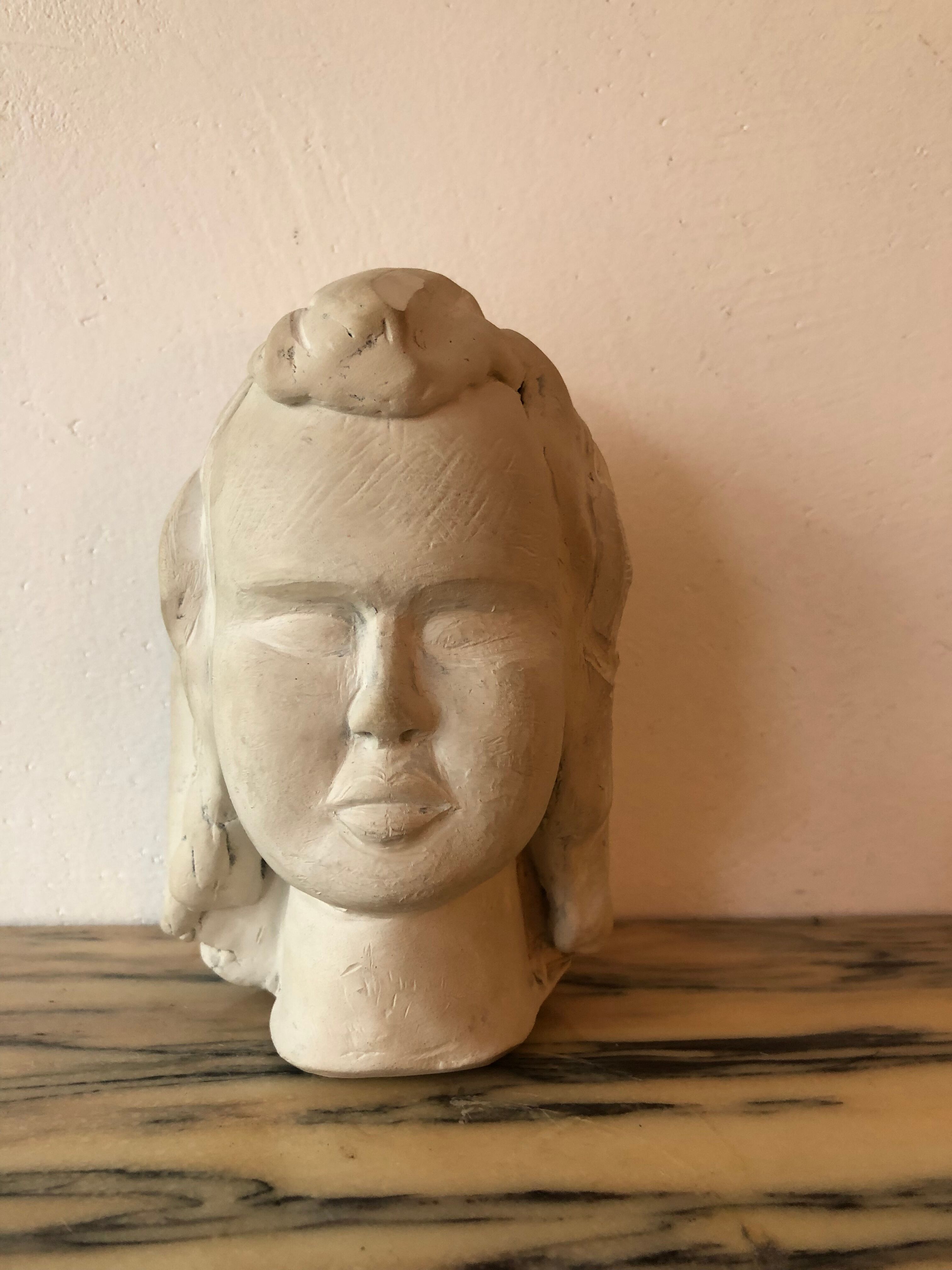 Tête en plâtre décorative
