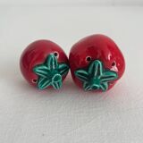 Vintage tomato salt and pepper shakers in slip