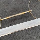 Coffee table in gilded brass and veined green marble