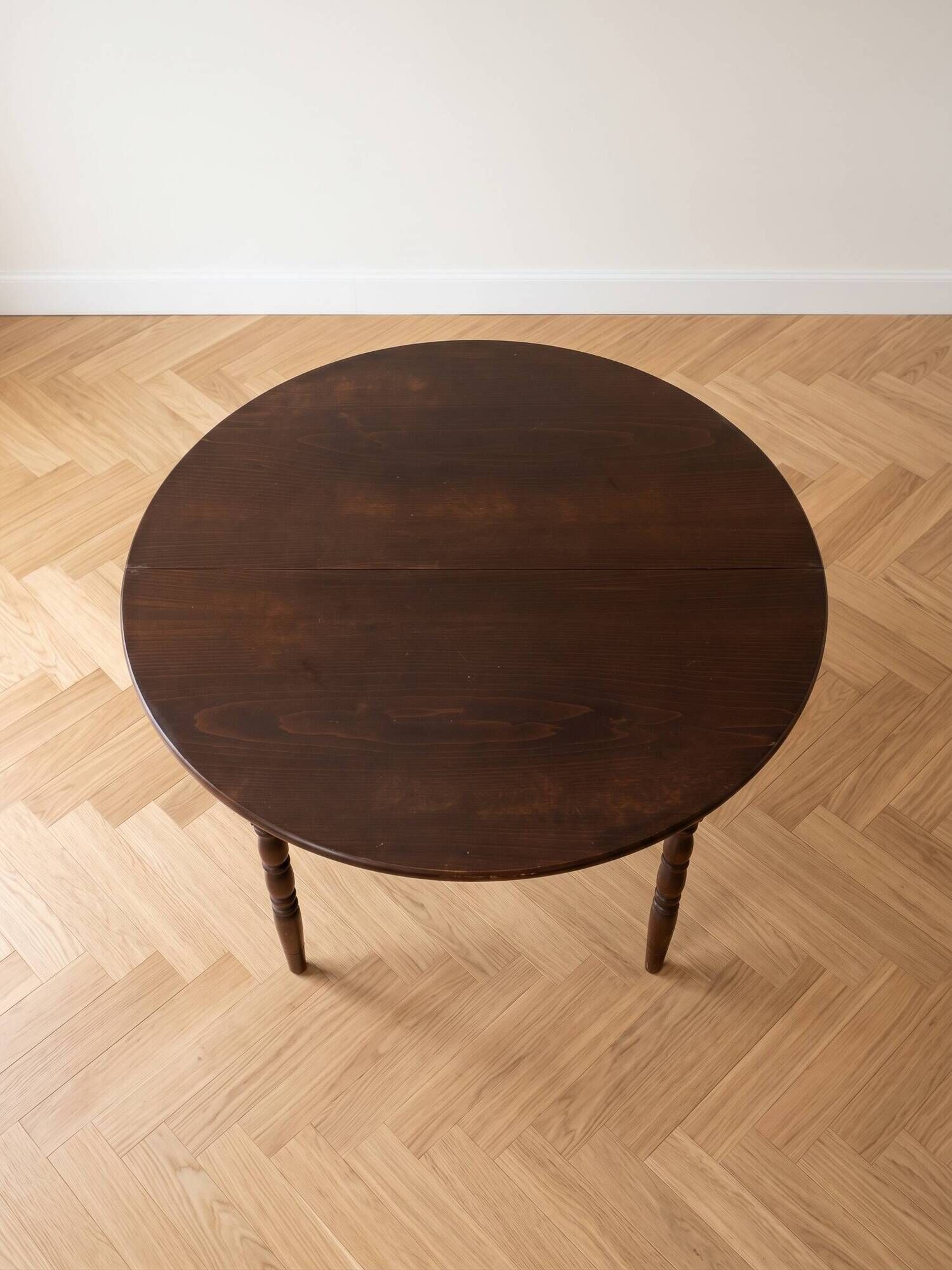 Traditional round wooden dining table