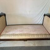 Antique Louis XVI style daybed in carved wood and patterned fabric
