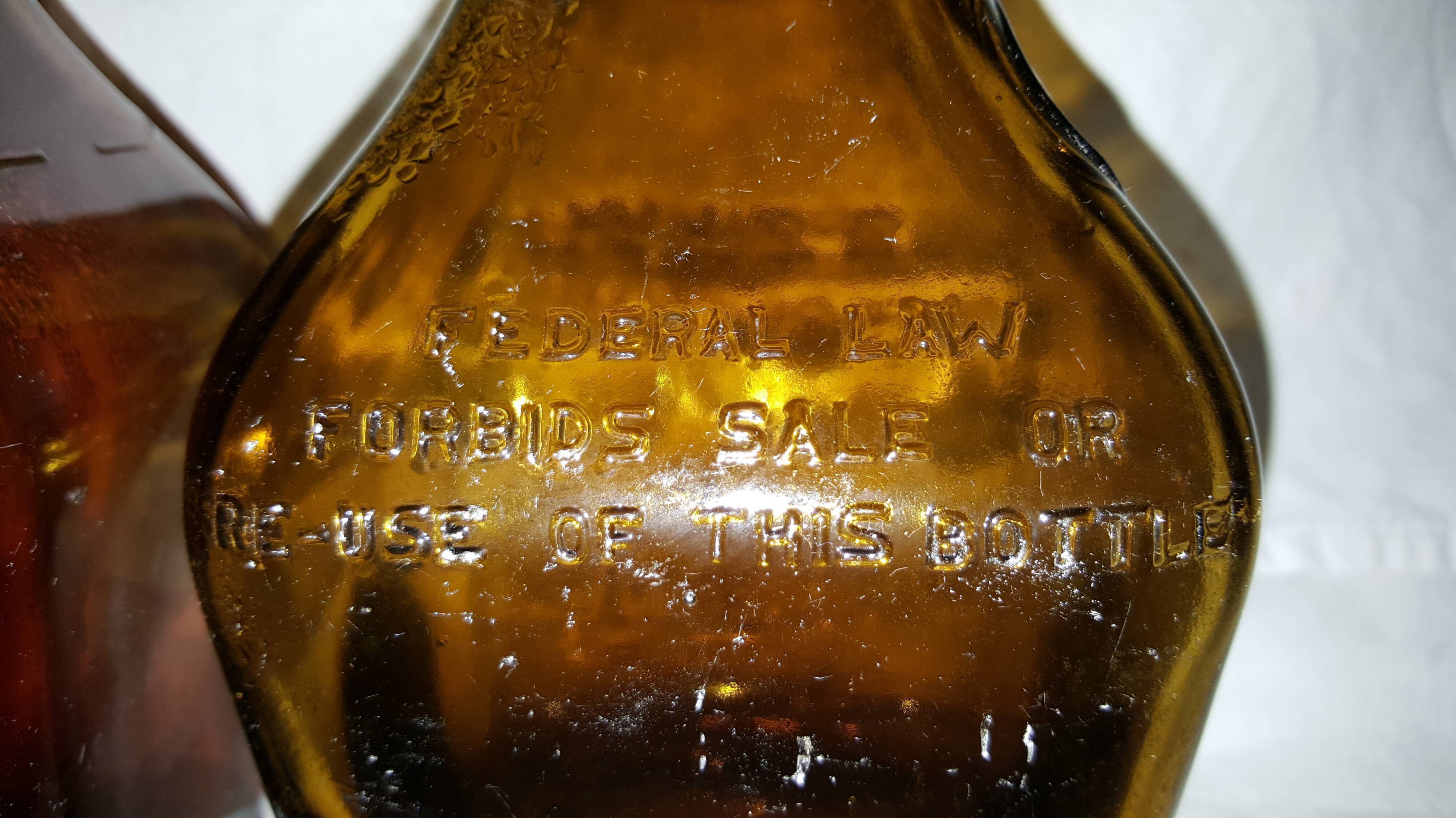 5 old bottles of Marie Brizard liqueur