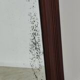 Antique beveled mirror on a wooden frame, 1930