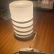 Vintage metal lamp with white glass.