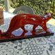 Red enameled panther