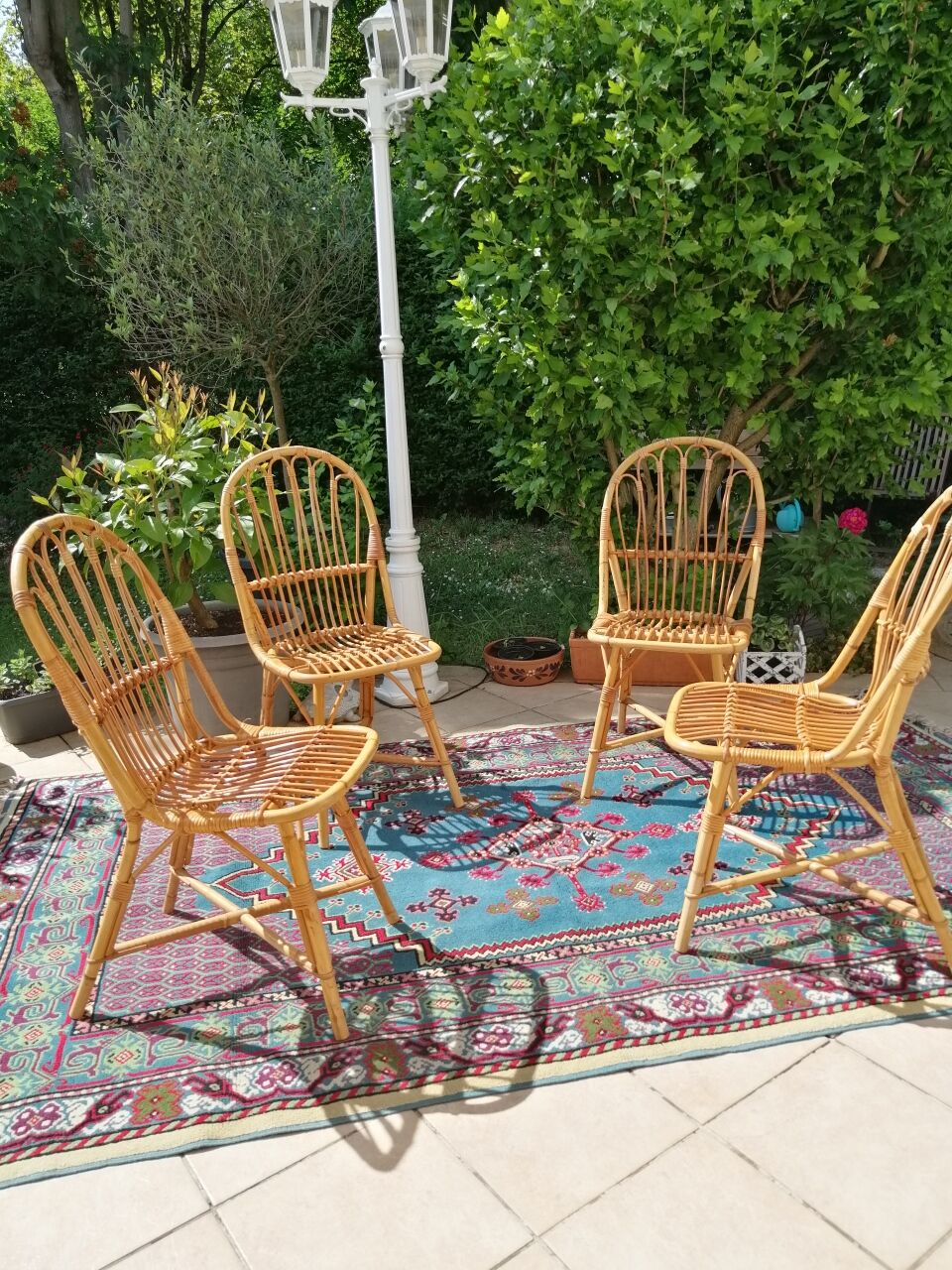 Series of 4 vintage rattan chairs.