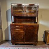 Vintage wooden display cabinet with yellow glass.