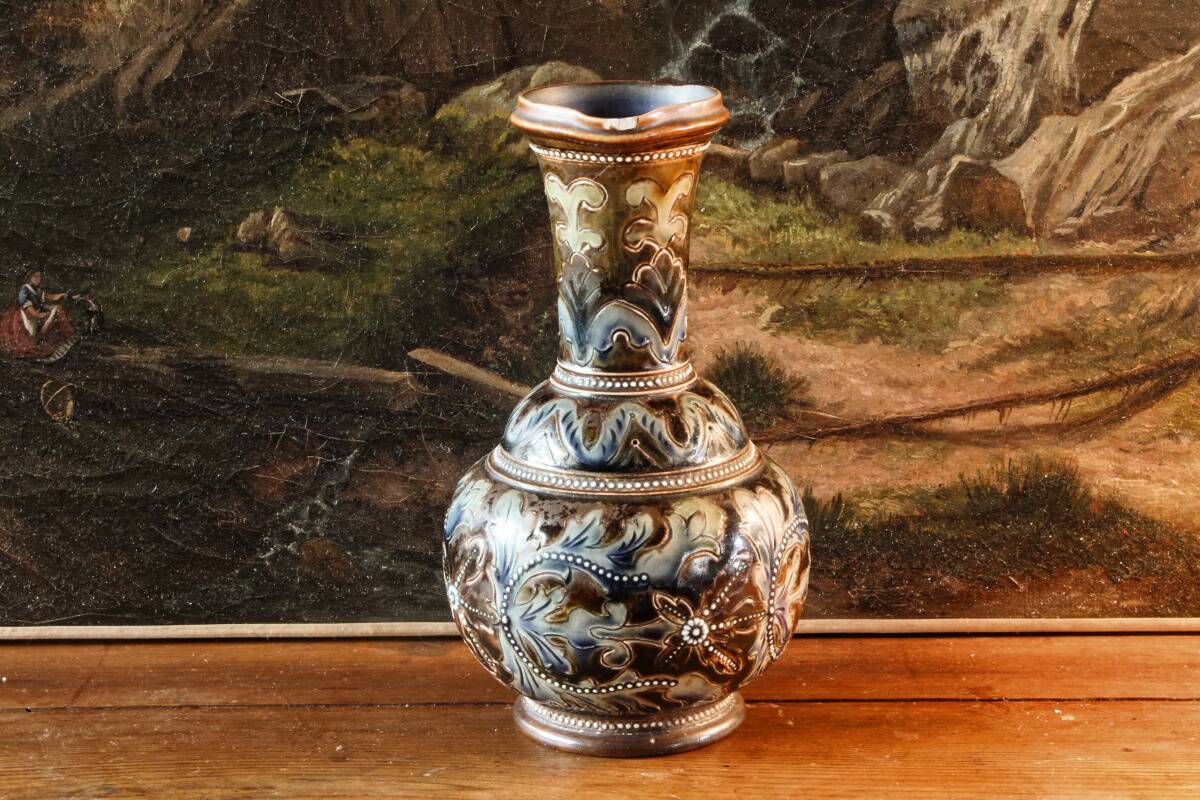 Doulton Lambeth stoneware jug (1879), floral decoration by Henry Winstanley.
