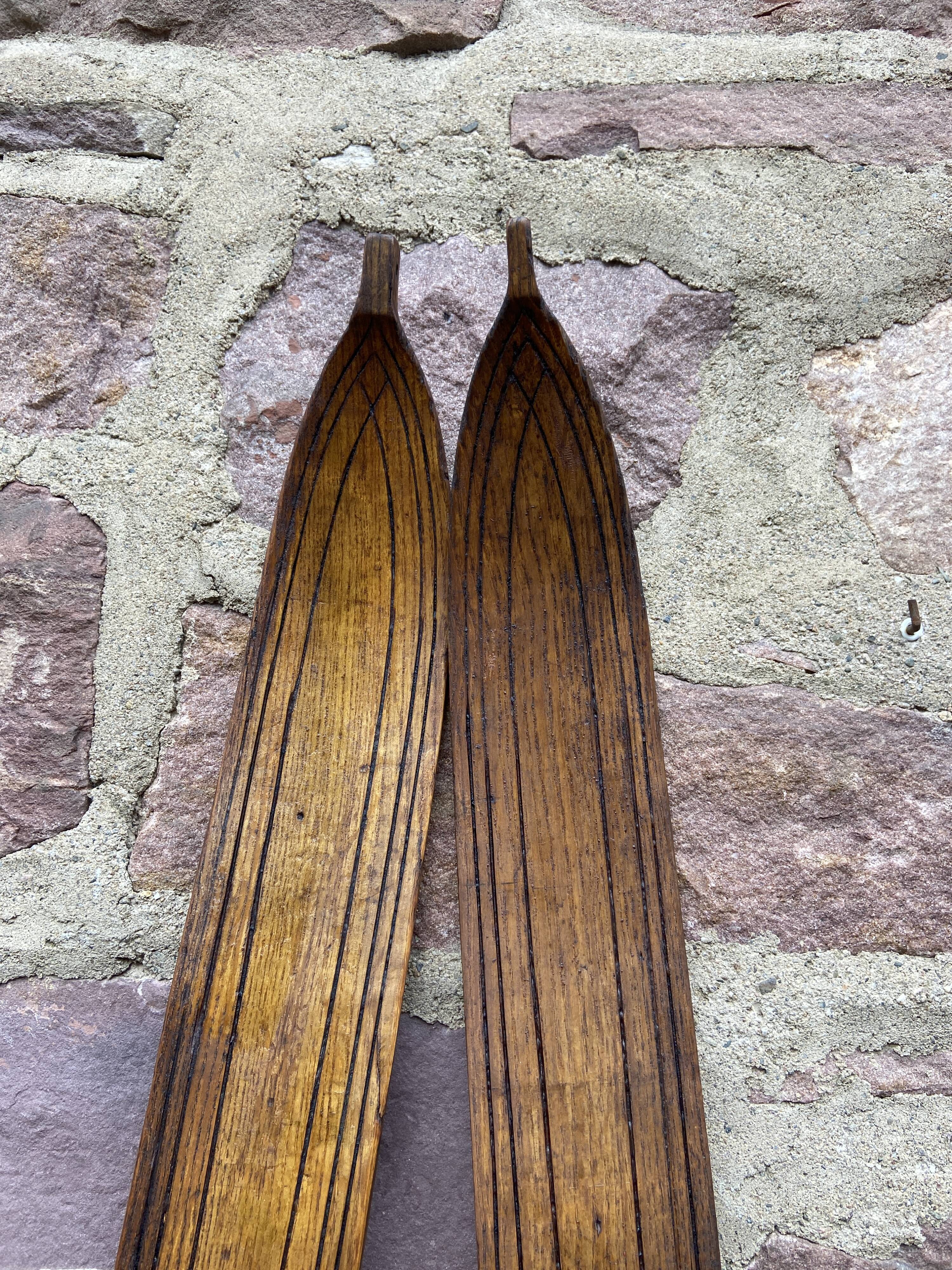 Pair of vintage wooden skis 1900-1920 mountain sport alsace chalet alps