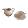 Milk pot or creamer and its matching cup