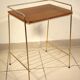 Side table - wooden and gold metal magazine rack